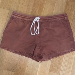 Pink fringe denim shorts that tie